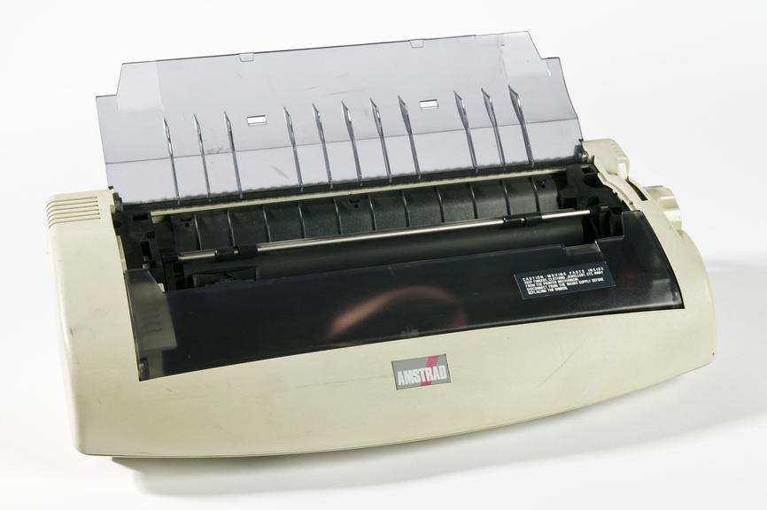 Amstrad PCW 9256 microcomputer with disc drive, printer