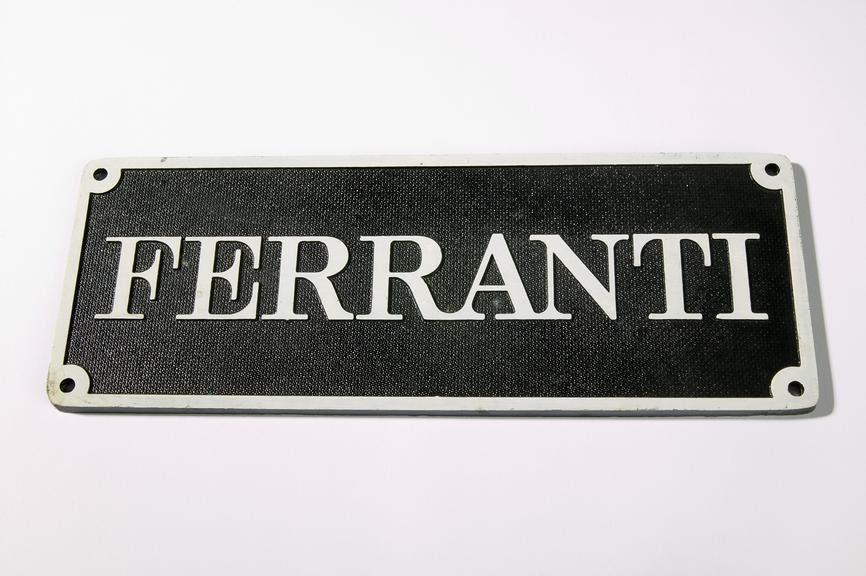 Ferranti name-plate.
Photographed on a white background.