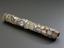 Tobacco pipe, encrusted with coins, buttons, badges, shells, plaques and crests