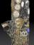 Tobacco pipe, encrusted with coins, buttons, badges, shells, plaques and crests