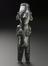 Silver male deity statue, Peruvian.