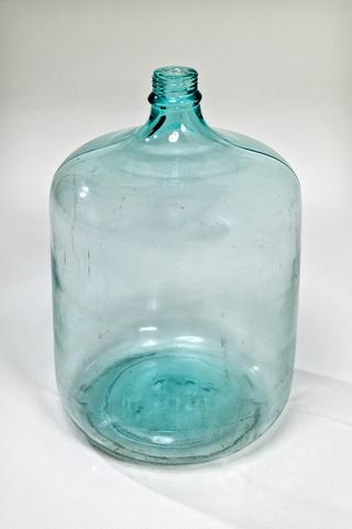 Large glass bottle used at Vimto