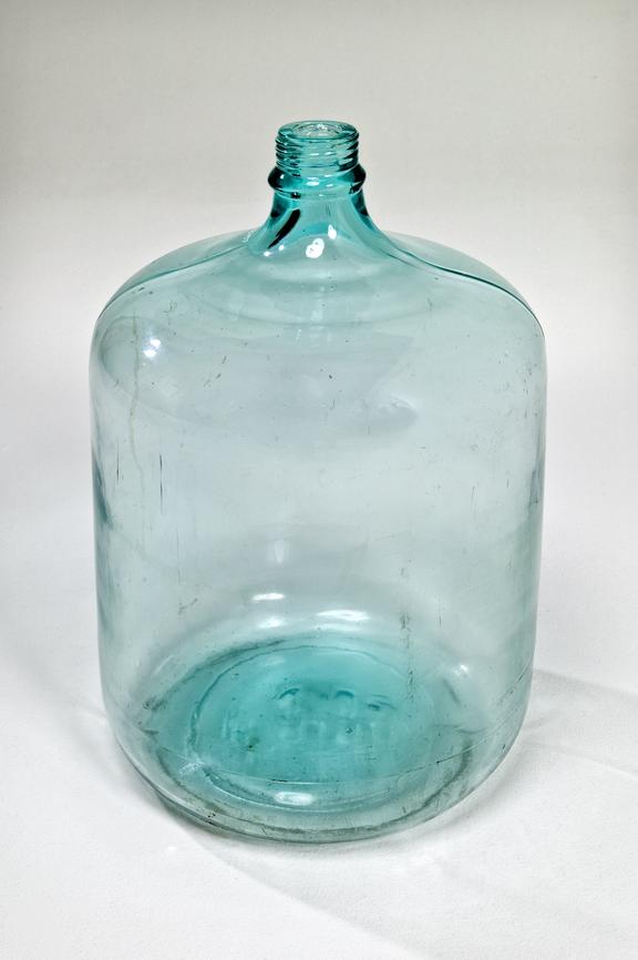Large glass bottle used at Vimto