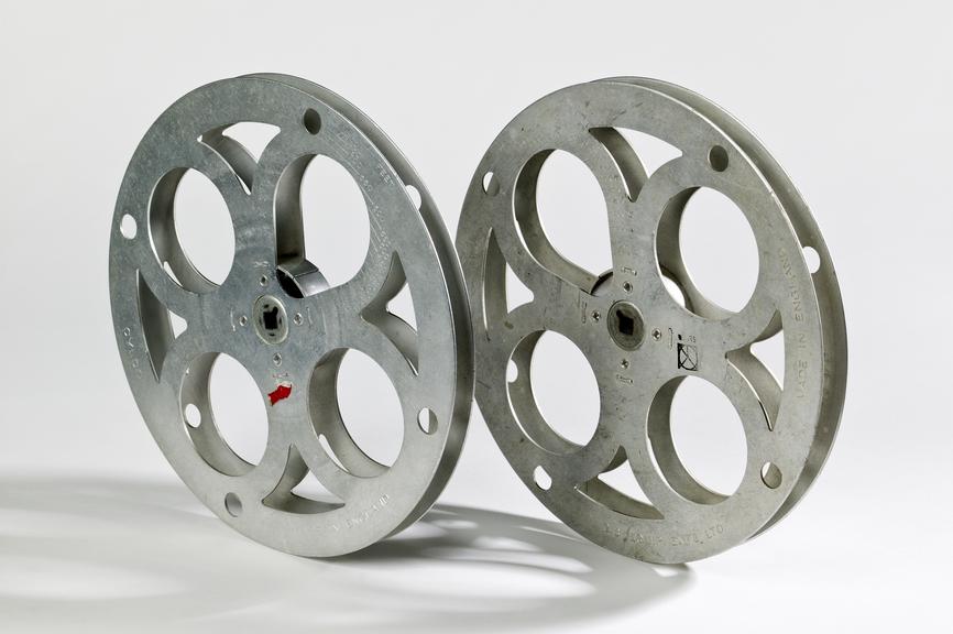 Two film reels for a 16mm Gebescope sound/silent cine projector