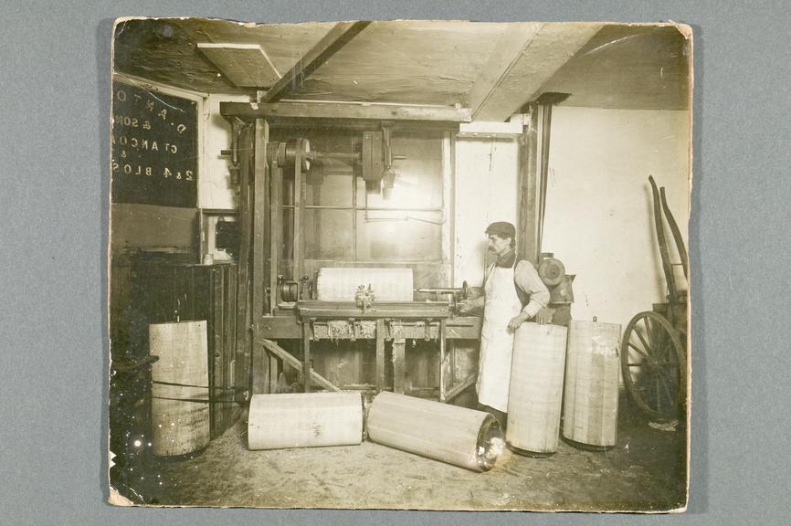 Black-and-white photograph showing the construction of barrel