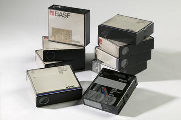 8 cassette tapes and plug attachment