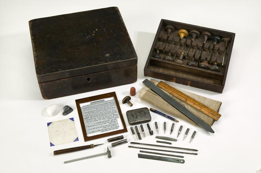 Wooden box containing copper plate engraving tools