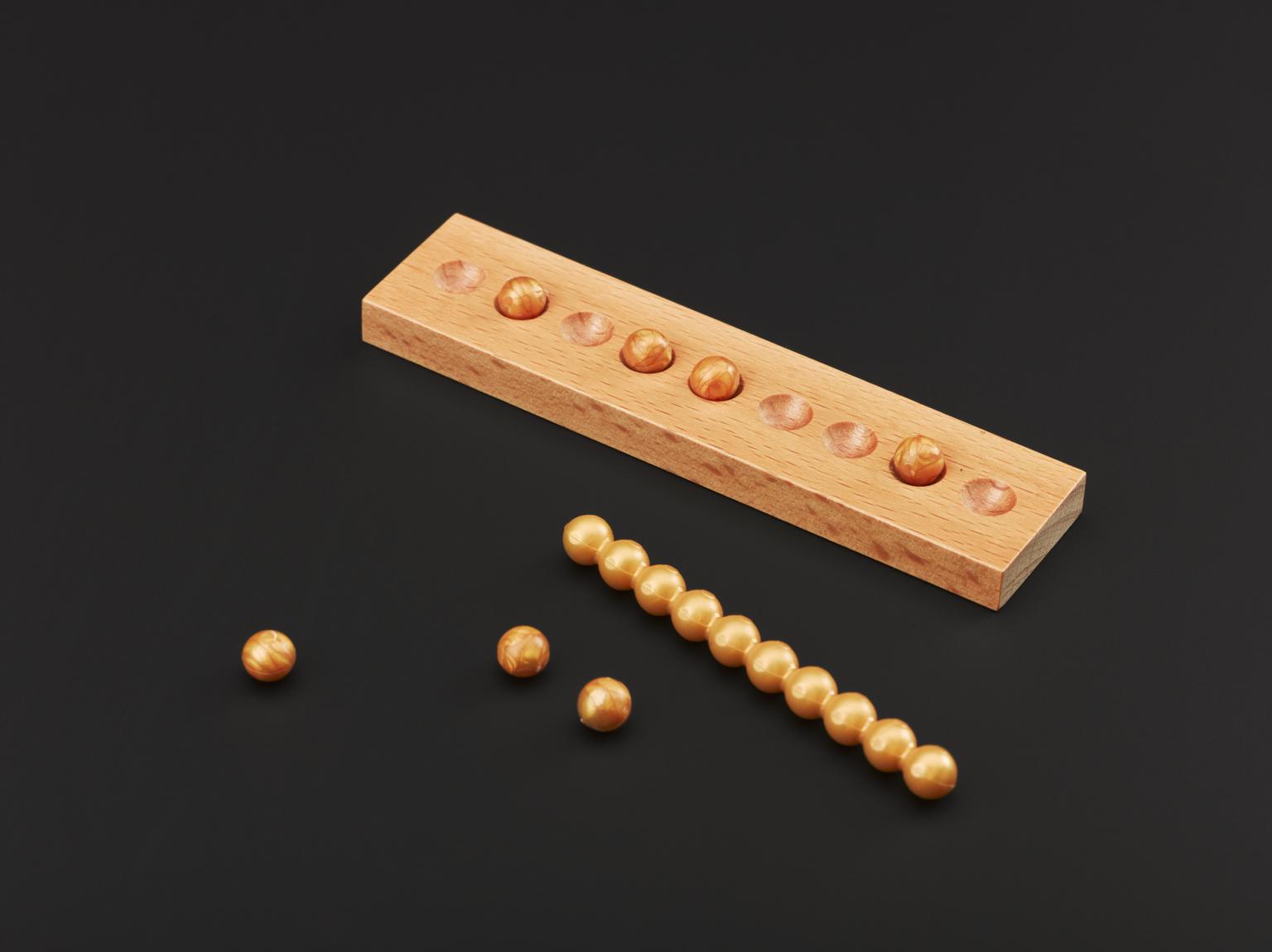 Selection of four wooden trays with some beads