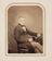 Two seated portrait photographs George Biddell Airy by Maull & Polyblank