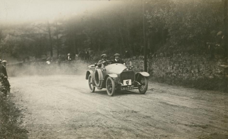 Photograph of a Darracq car in a race