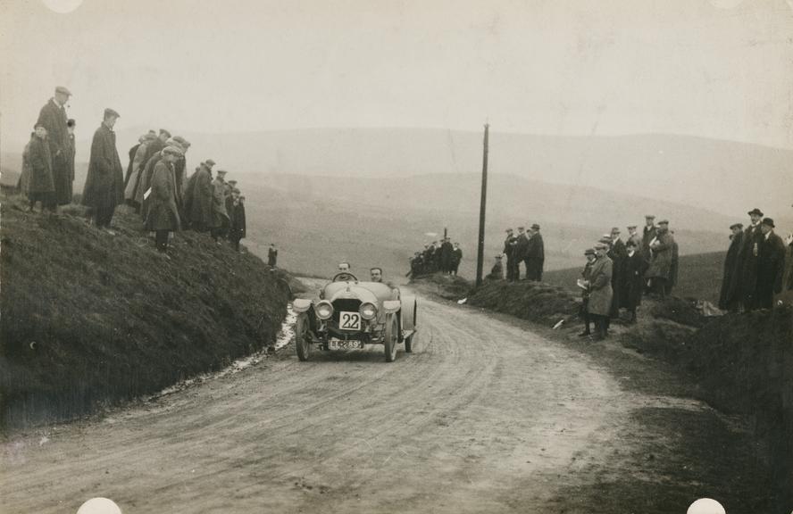 Photograph of a car in a race (Photograph)