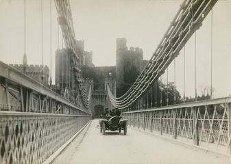 Photograph of a motor car on a suspension bridge | Science Museum Group ...