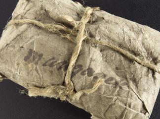 Paper packet of Manganese, tied with string