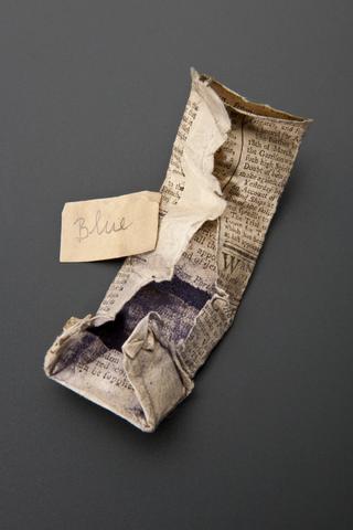 Newspaper packet, with label reading 'Blue'