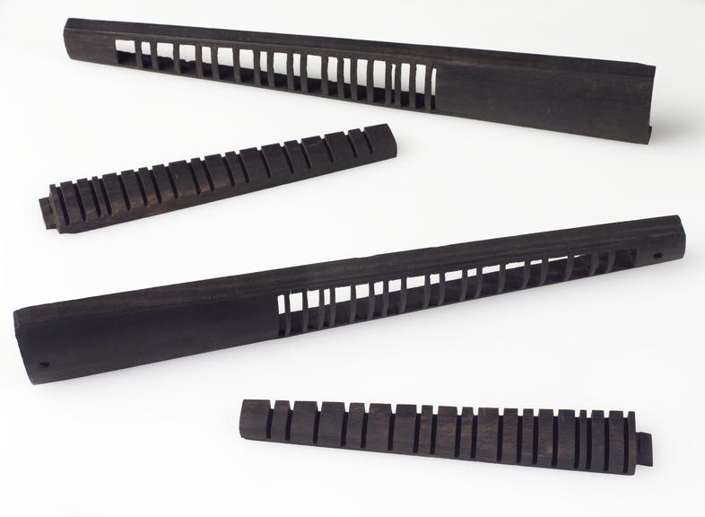 Pair of ebony violin fingerboard shape and sized hollow fabrications