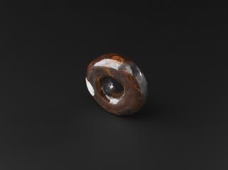 Shape deformed from an annulus one of four solid bodies (in clay) of genus 1