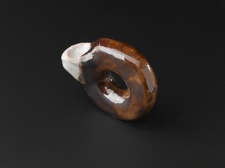 Shape deformed from an annulus one of four solid bodies (in clay) of genus 1