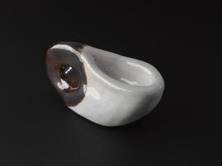 Shape deformed from an annulus one of four solid bodies (in clay) of genus 1