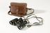 Pair of 'Kingsway' binoculars with leather carry case made by