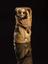 Netsuke in form of skeleton holding fan