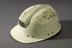 Coal miner's helmet.
Photographed on a grey background.