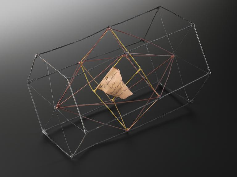 Crystal structure represented by a wire rhombohedron with three equal axes