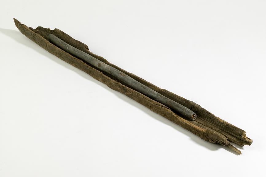 Section of early lead-sheathed telephone cable in wooden