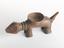 Carved wooden tobacco mortar in the form of a dog(?) with