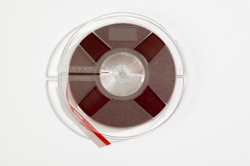 Red reel-to-reel tape for use on a Uher tape recorder