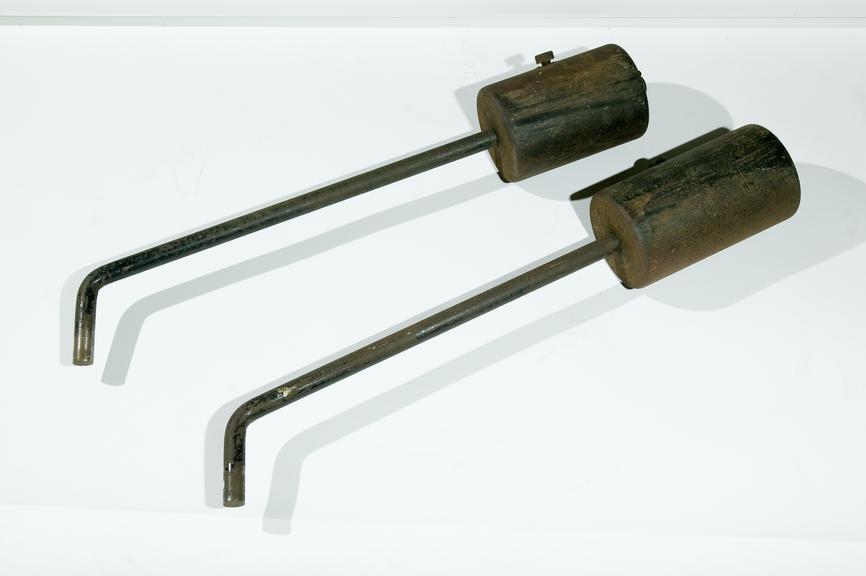Two machine weights.Photographed on a white background.
