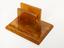Square letter rack with two trapezoidal uprights to hold