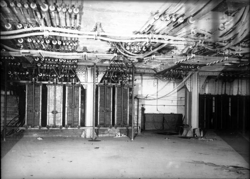 Works photographic negative of cables clipped to ceiling, LCC