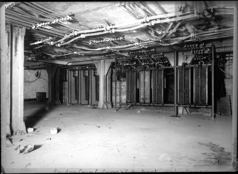 Works photographic negative of cables clipped to ceiling, LCC