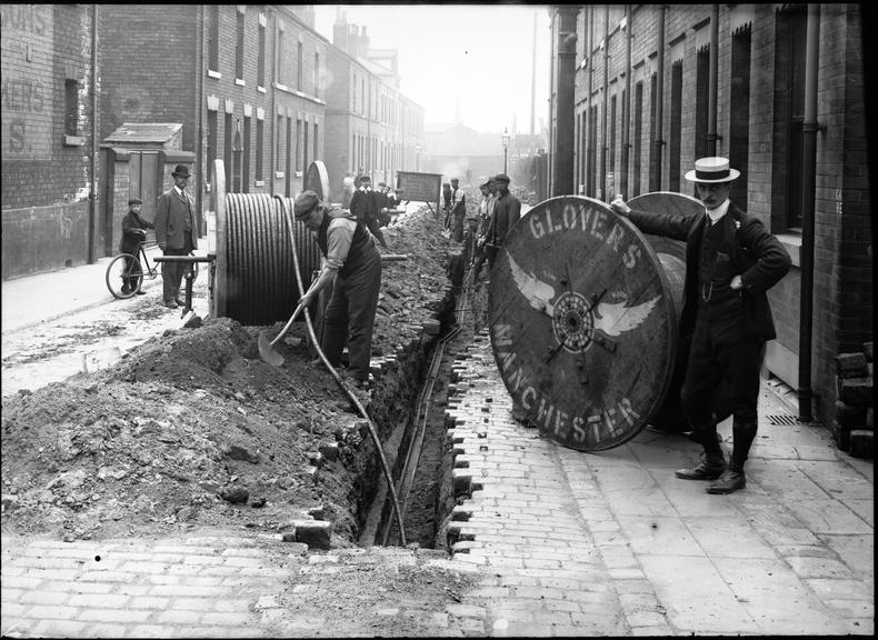 Works photographic negative of cable laying, Leeds and Wakefield