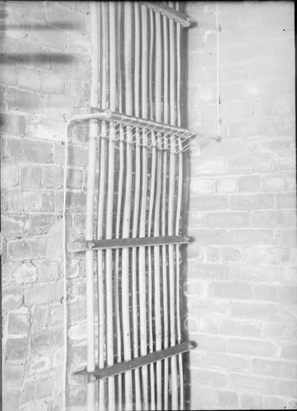 Works photographic negative of a vertical cable run, Todmorden