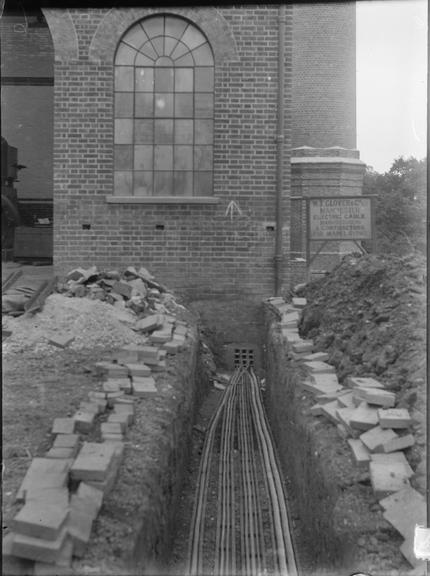 Works photographic negative of cables in troughing