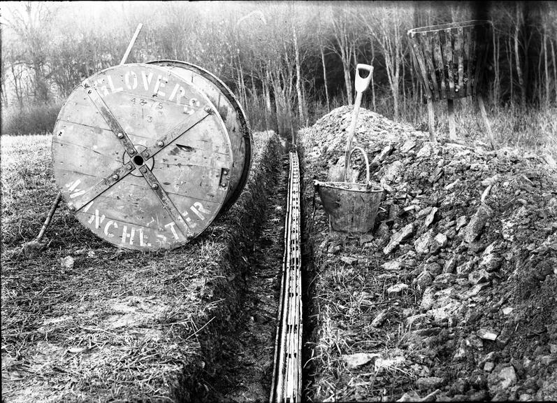 Works photographic negative of cable laying