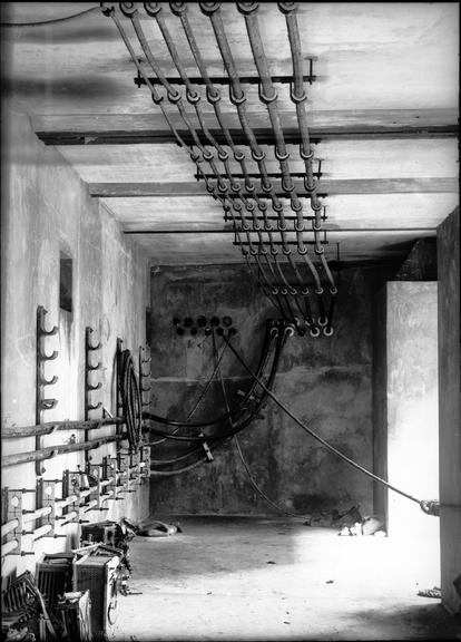 Works photographic negative of cable runs mounted on walls