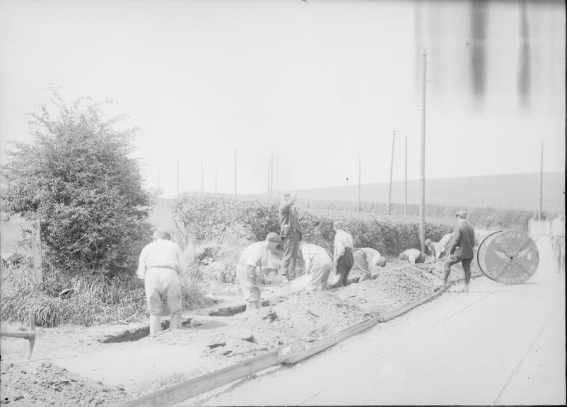 Works photographic negative of men working in trench, Paisley