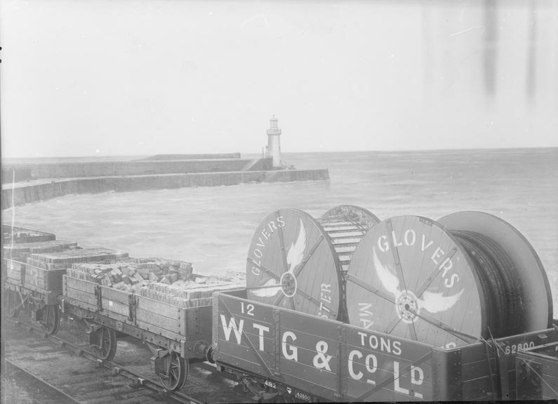 Works photographic negative of cable drums in a railway wagon