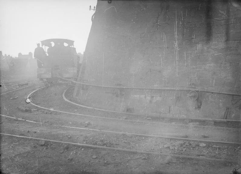 Works photographic negative of locomotive pulling cable