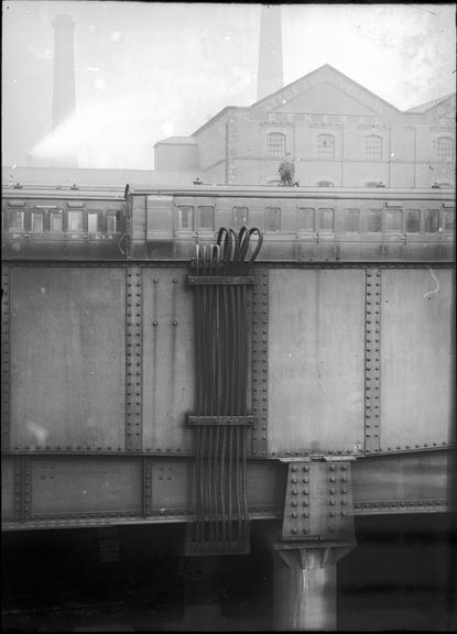 Works photographic negative of cables on railway bridge girder