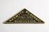 Triangular brass nameplate. Marked 'Naysyth Wilson & Co, No