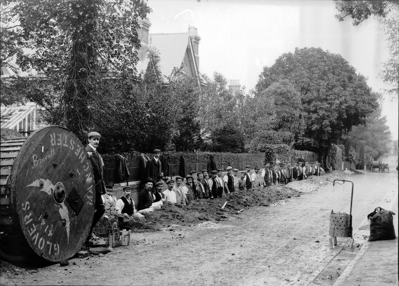 Works photographic negative of men in trench, Bournemouth