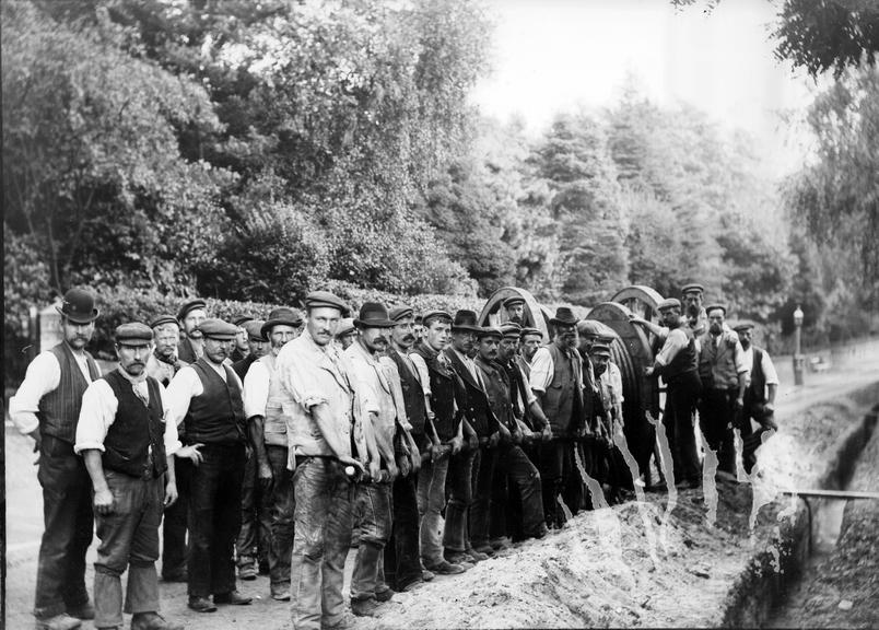 Works photographic negative of men holding cable, Bournemouth