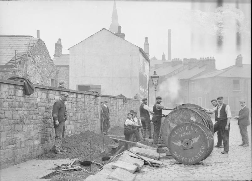 Works photographic negative of men with cable drums, Accrington