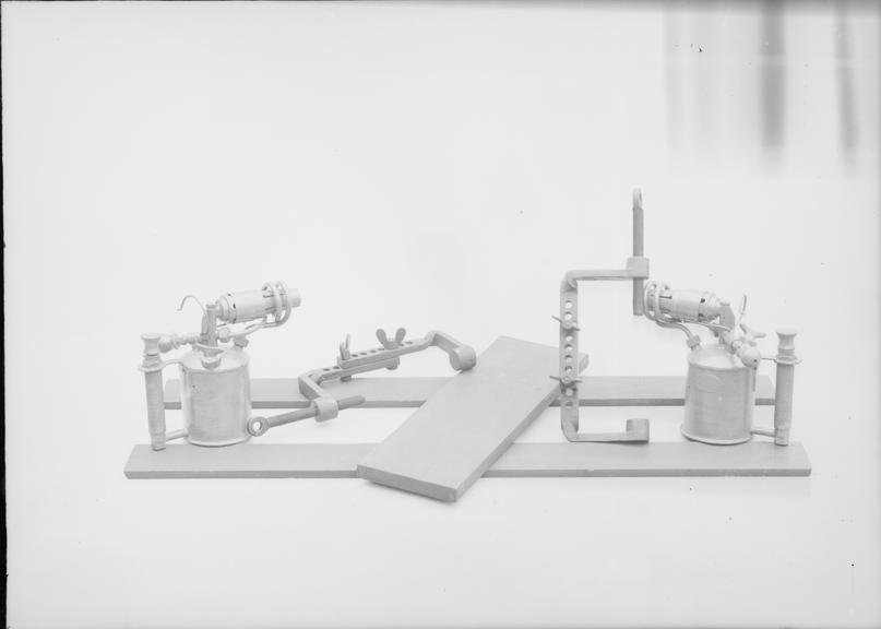 Works photographic negative of blowlamps, clamps and plates