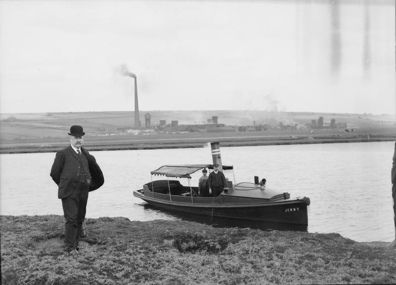 Works photographic negative of man on canal bank