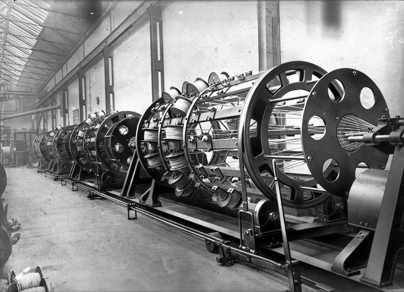 Works photographic negative of cabling up machine