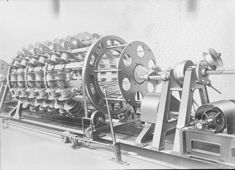 Works photographic negative of cabling up machine